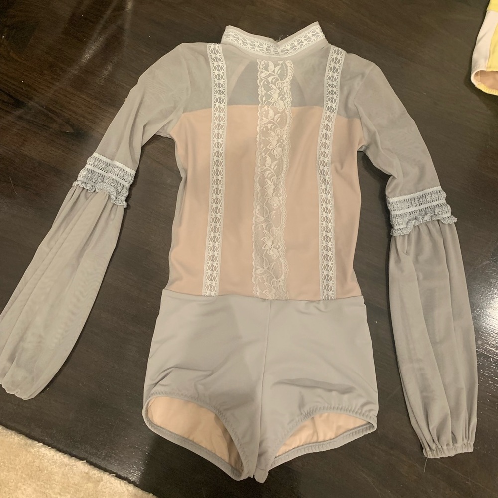 CUSTOM SOLO COSTUME LEO. very elegant and hand stitched lace trimmed mesh leo